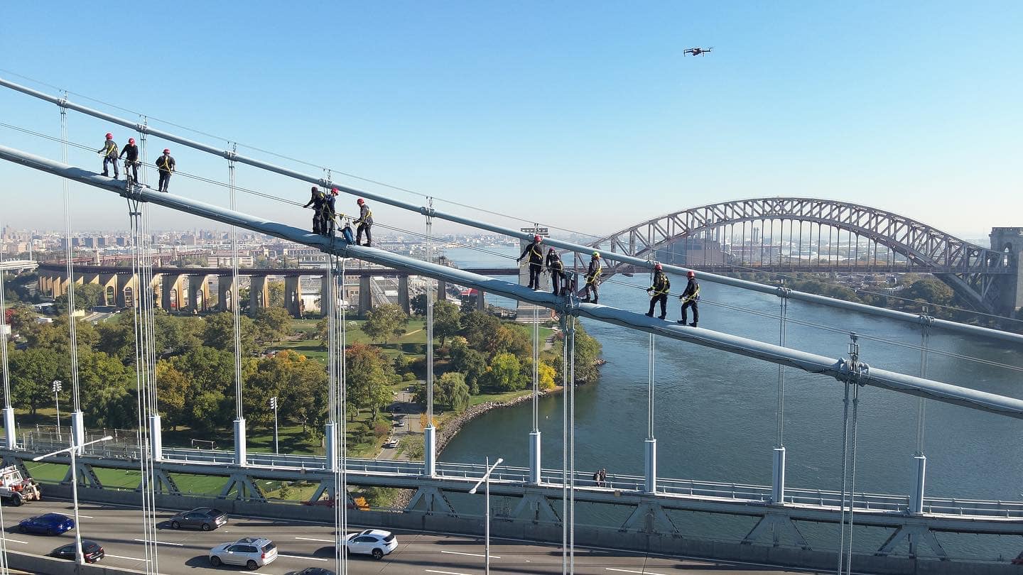 FDNY Squad 288 members operating high above a bridge in rescue conditions